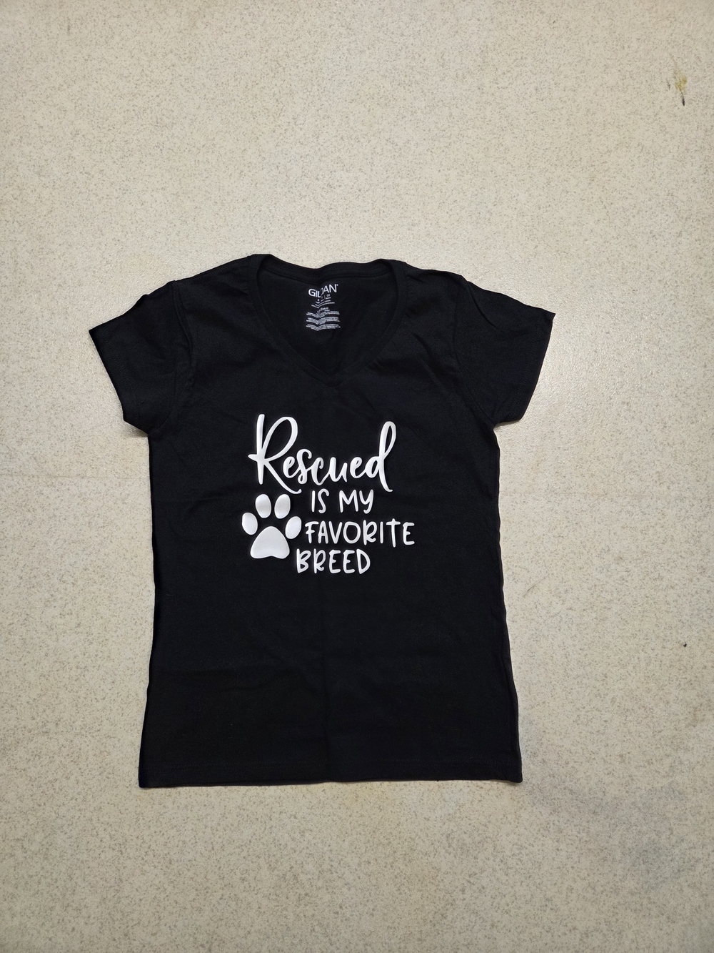 Black Tee with White "Rescued Is My Favorite Breed" Paw Graphic